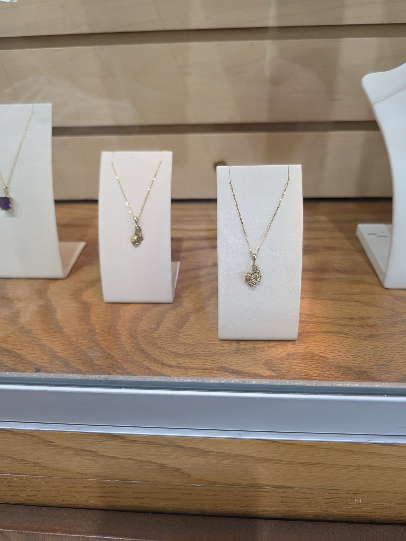 Display of jewelry pieces inspired by the gold-mining brand.