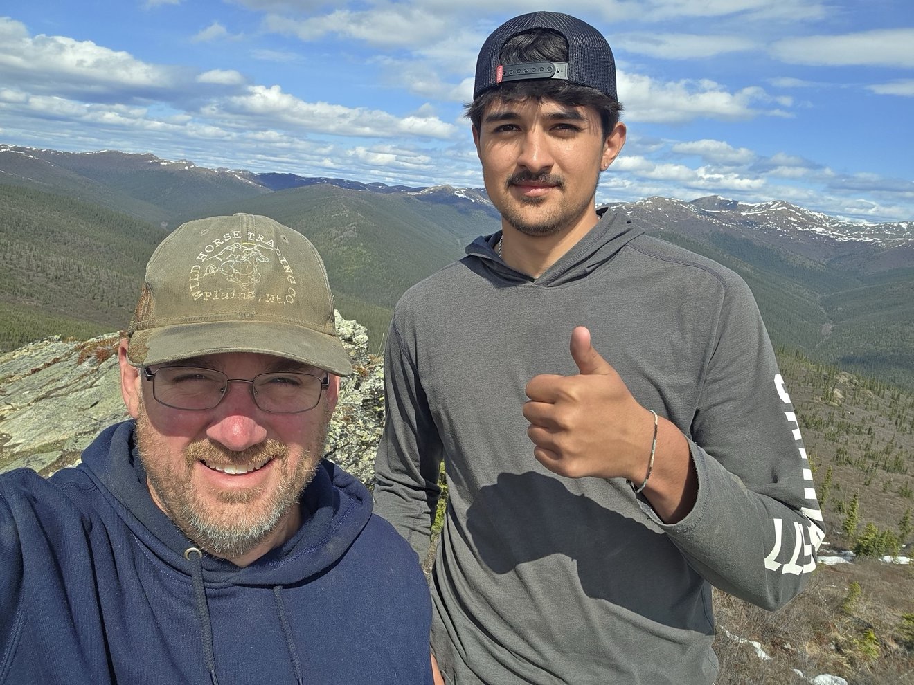Crew selfie in the mountains above the claim.